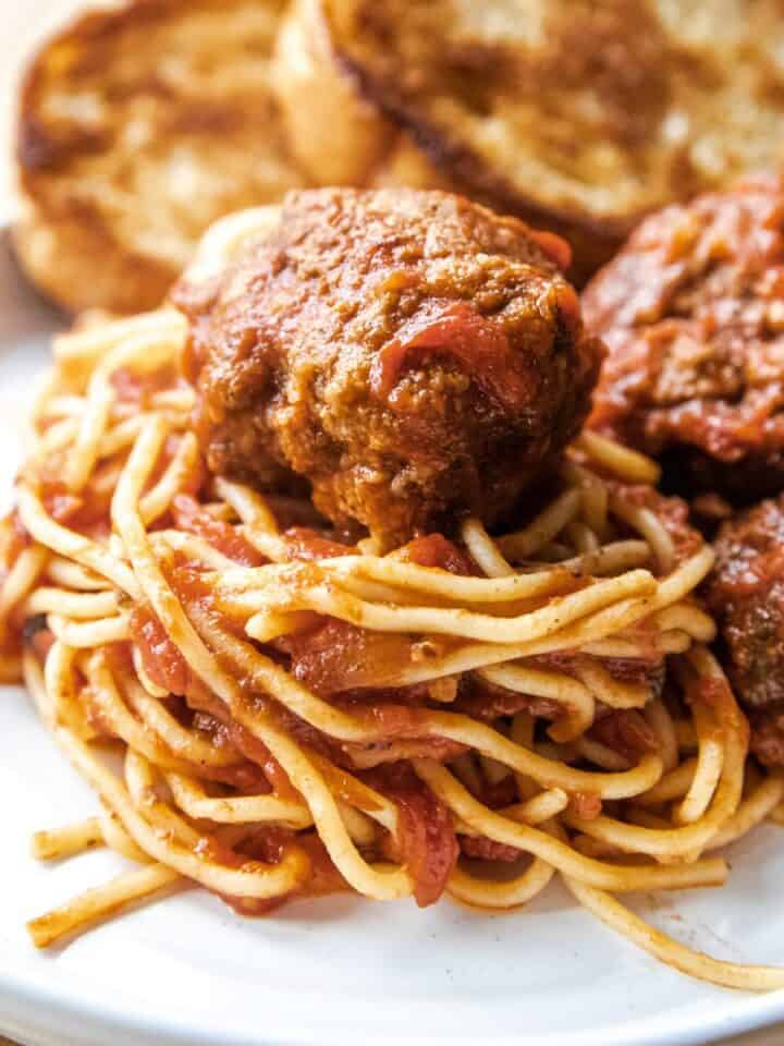 Classic Italian spaghetti with meatballs and tomato sauce.