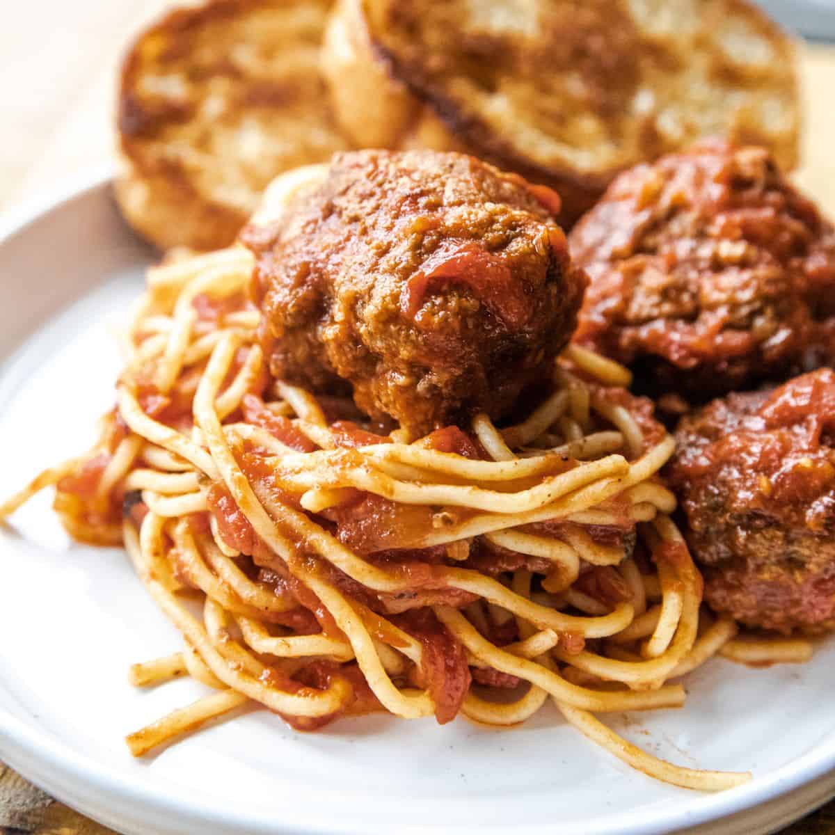 Classic Italian spaghetti with meatballs and tomato sauce.