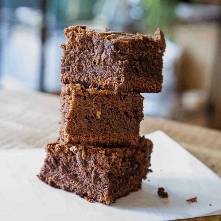 Stacked brownies with rich chocolate flavor and fudgy texture. Perfect for gatherings and dessert lo.
