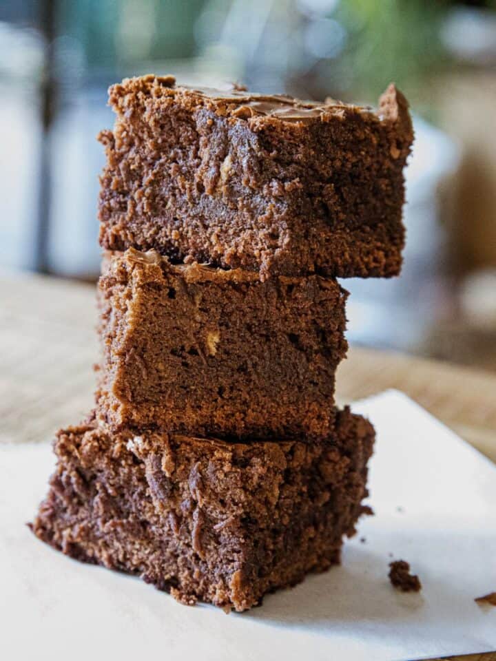 Stacked brownies with rich chocolate flavor and fudgy texture. Perfect for gatherings and dessert lo.