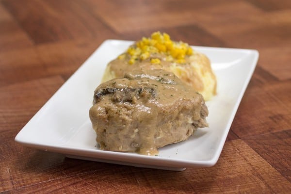 These made-from-scratch slow cooker pork chops with creamy mushroom gravy are so tender, moist, and delicious!