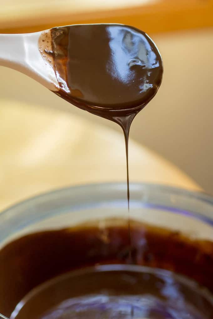 Caramel Filled Brownies are made from scratch, require no mixer, and are the perfect balance between a fudgey and cakey brownie.