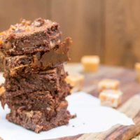 Caramel Filled Brownies are made from scratch, require no mixer, and are the perfect balance between a fudgey and cakey brownie.