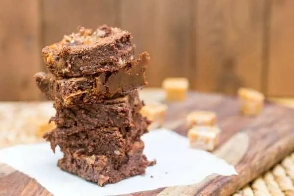 Caramel Filled Brownies are made from scratch, require no mixer, and are the perfect balance between a fudgey and cakey brownie.