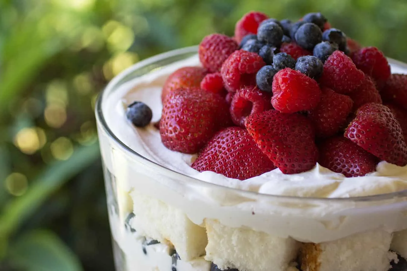 Amazing triple berry trifle with chambord and grand marnier in the whipped cream!