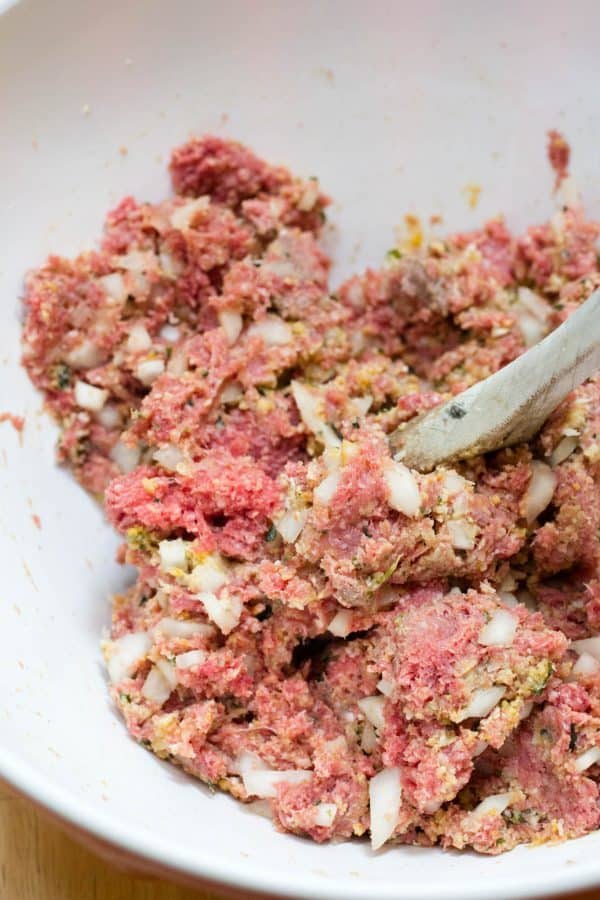Mix together the meatball ingredients until everything is well distributed.