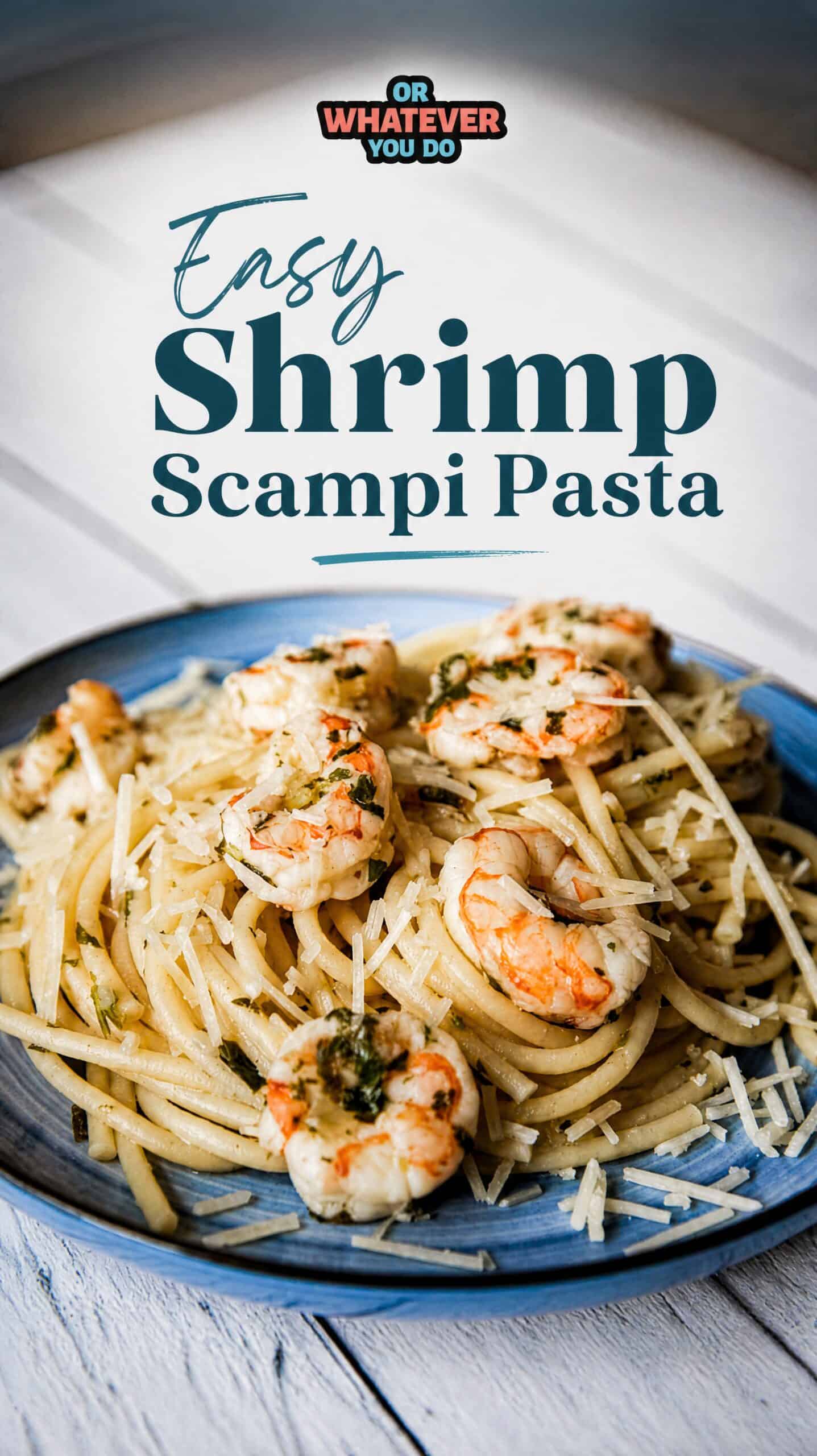 Delicious shrimp scampi pasta served on a blue plate with grated cheese.