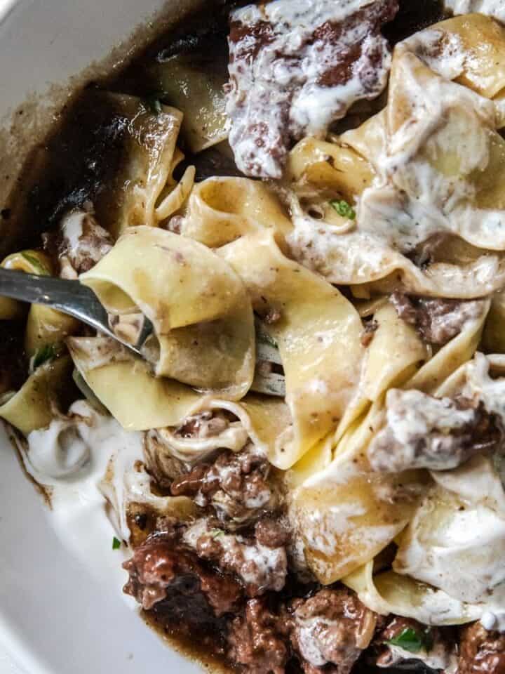Close-up of creamy ground beef stroganoff with noodles and mushrooms.