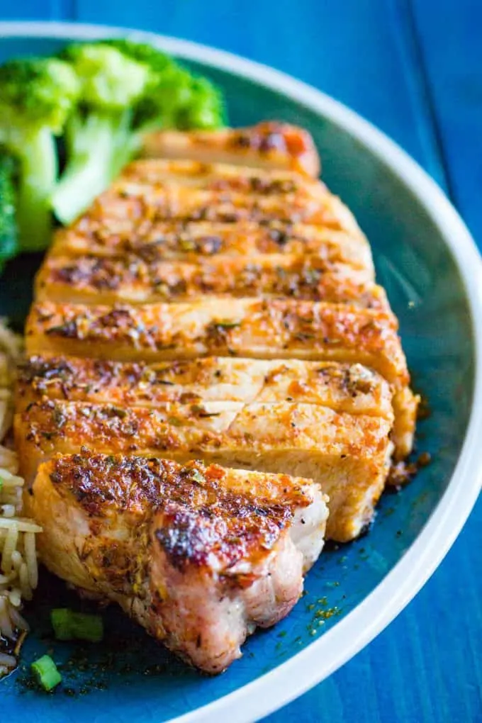 Blackened Pork Chops on a blue plate