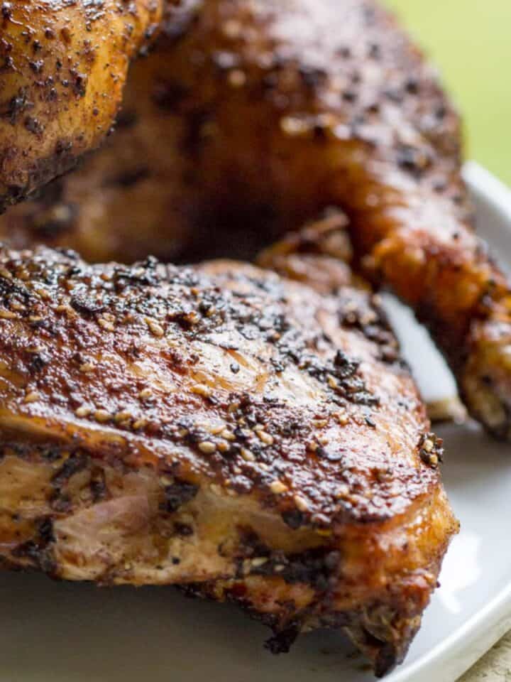 Delicious Traeger grilled chicken leg quarters with crispy skin and smoky flavor. Perfect for outdoo.
