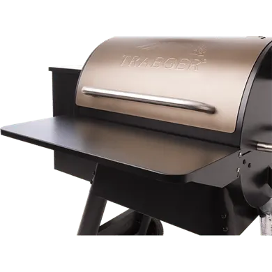 Traeger shelf accessory on a Traeger grill