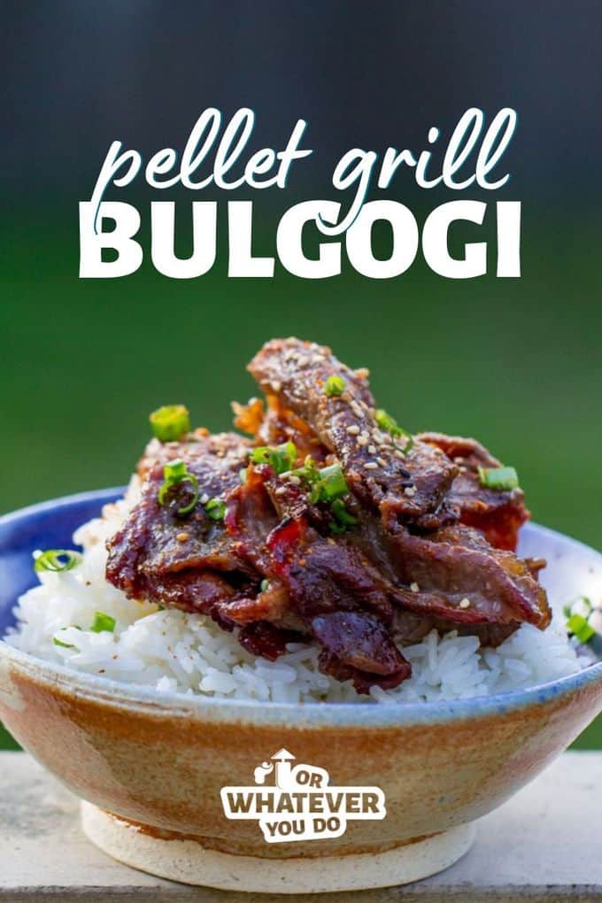 Beef Bulgogi on top of a bed of rice in a blue pottery bowl