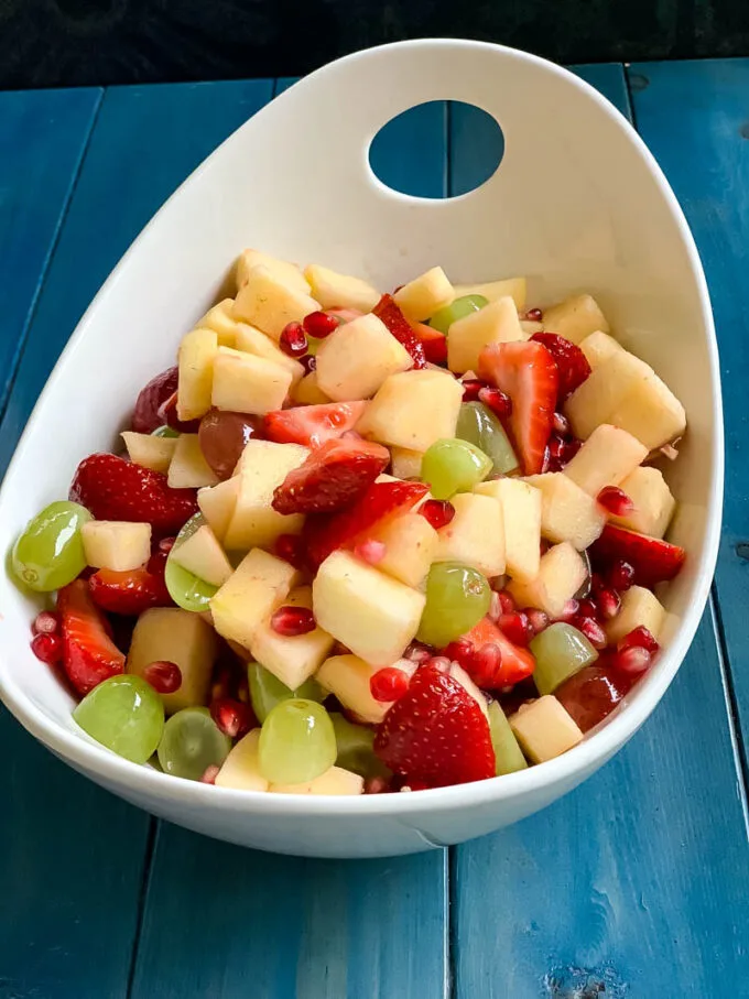 Fruit salad in a large white bowl