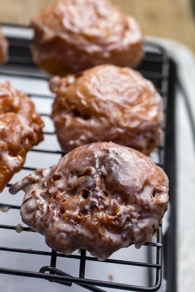 Apple Fritters close-up on a wire rack