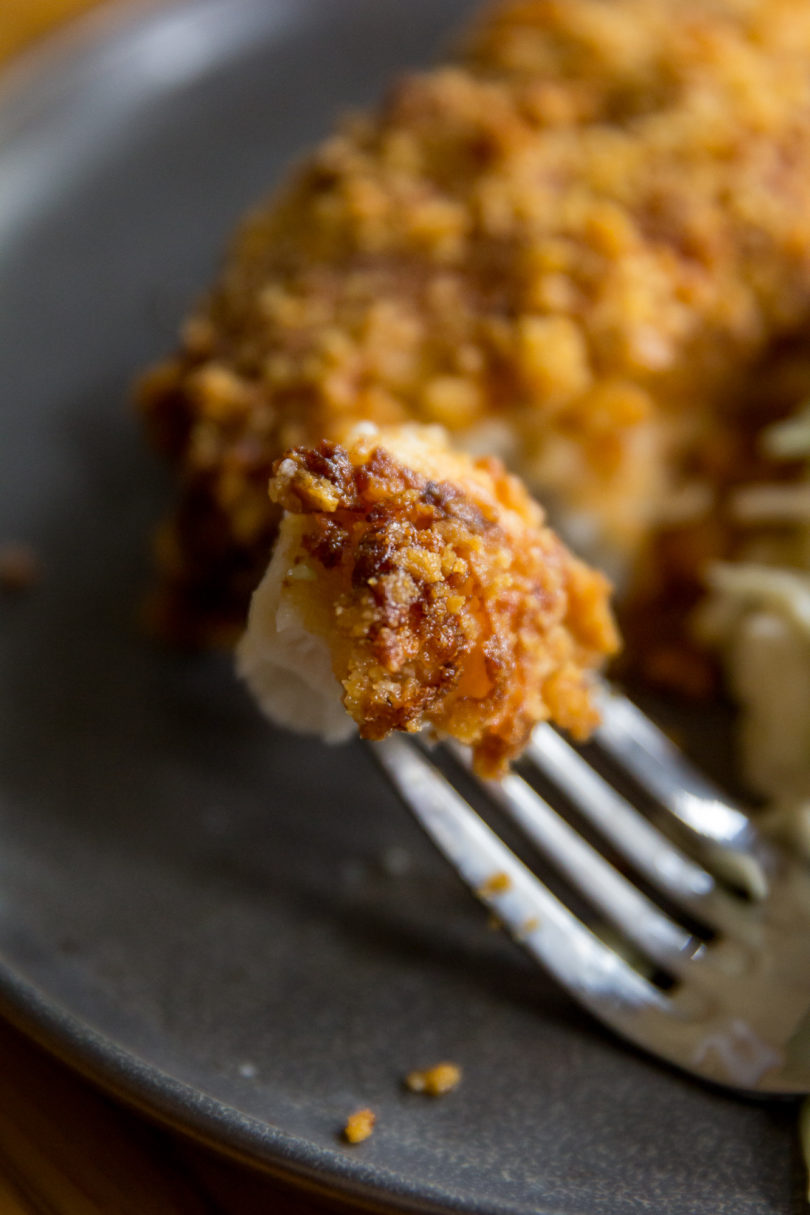 Bite of Air Fryer Parmesan Crusted Halibut on a fork