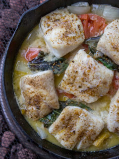 Pellet Grill Lingcod with White Wine and Garlic in a cast iron pan