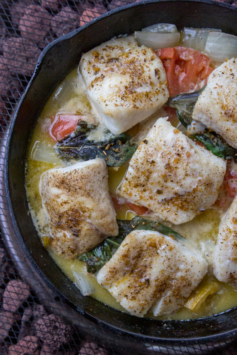 Pellet Grill Lingcod with White Wine and Garlic in a cast iron pan