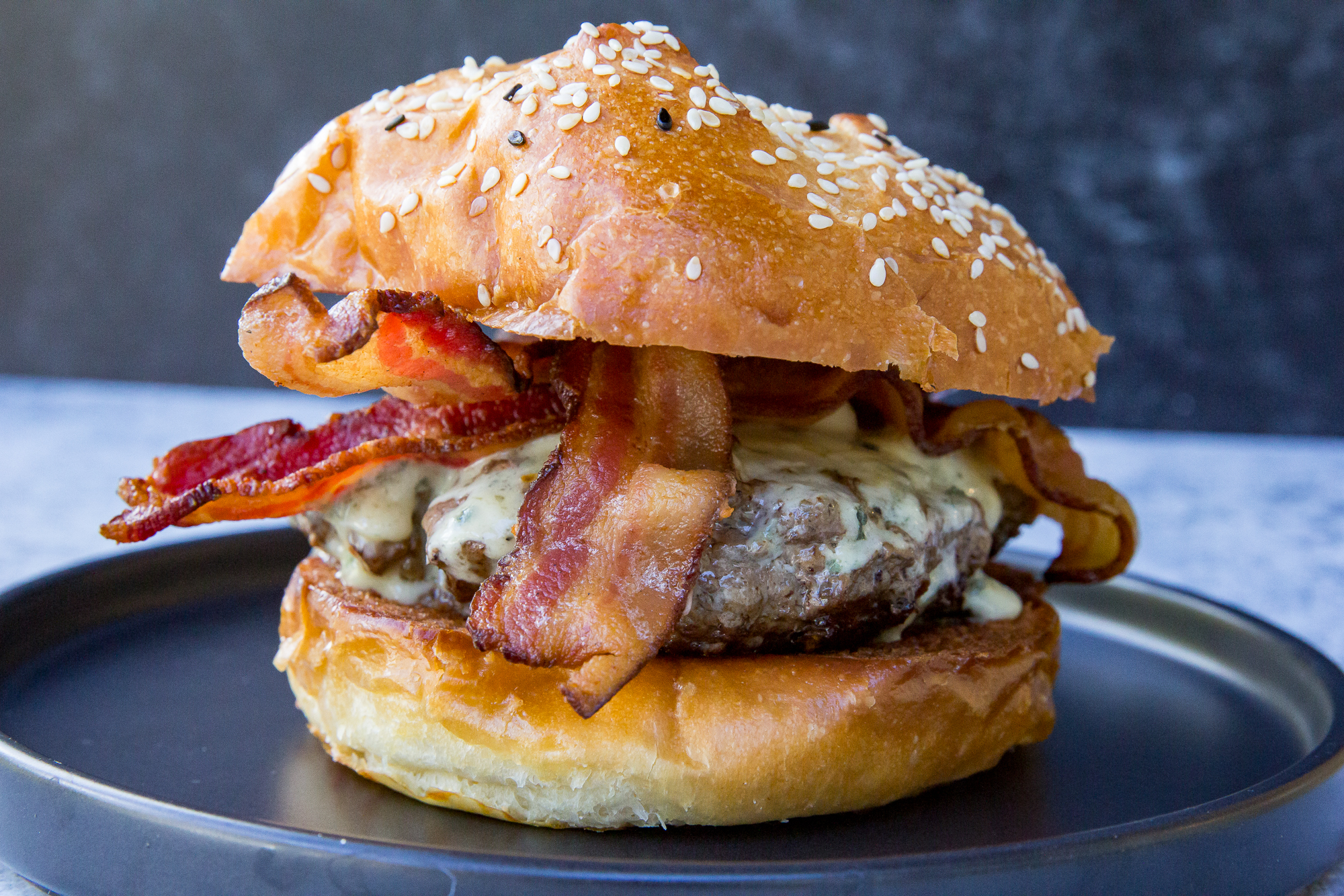 Grilled Bacon Burgers with Caramelized Onions and Blue Cheese