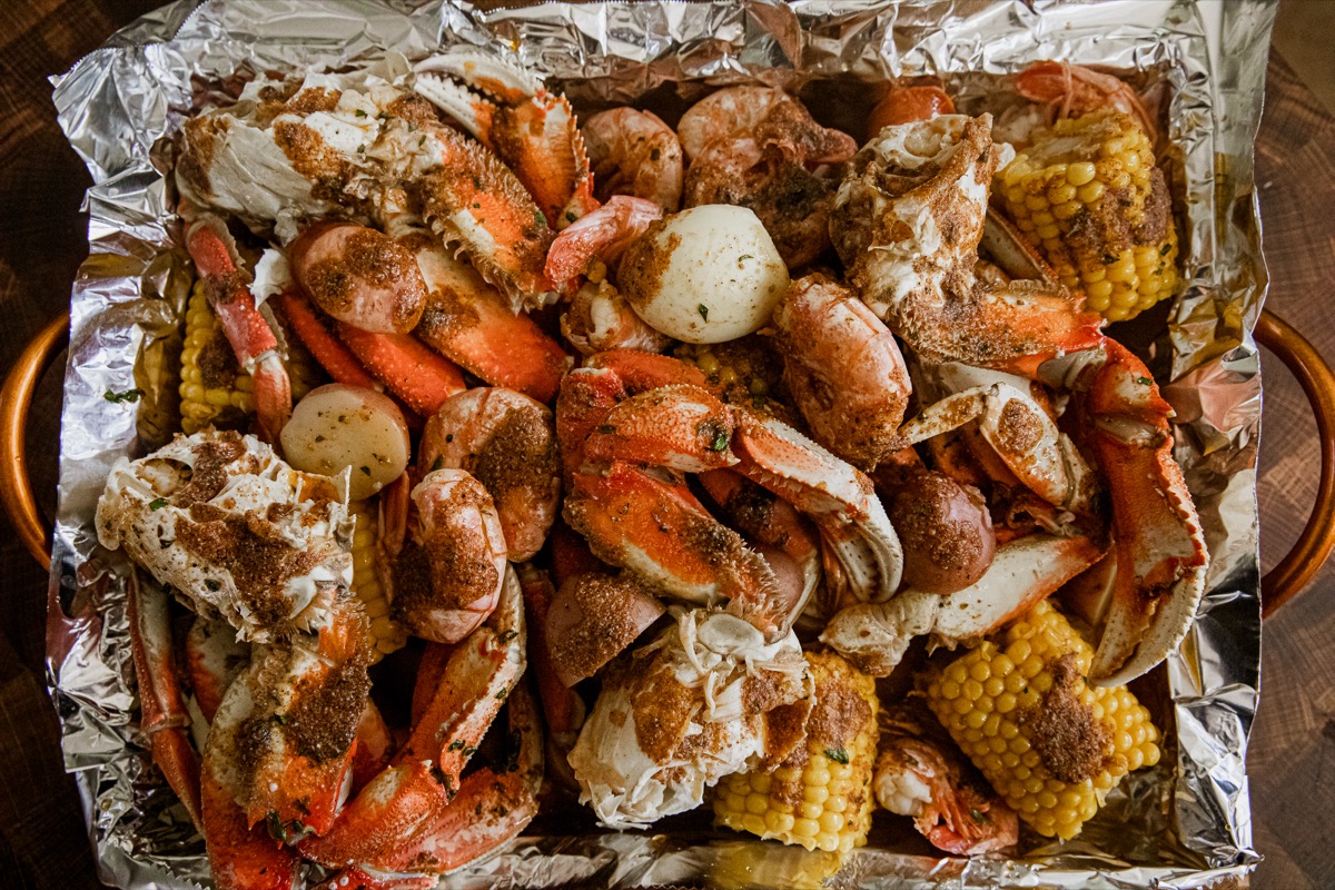 Spicy seafood boil with sausage and corn.