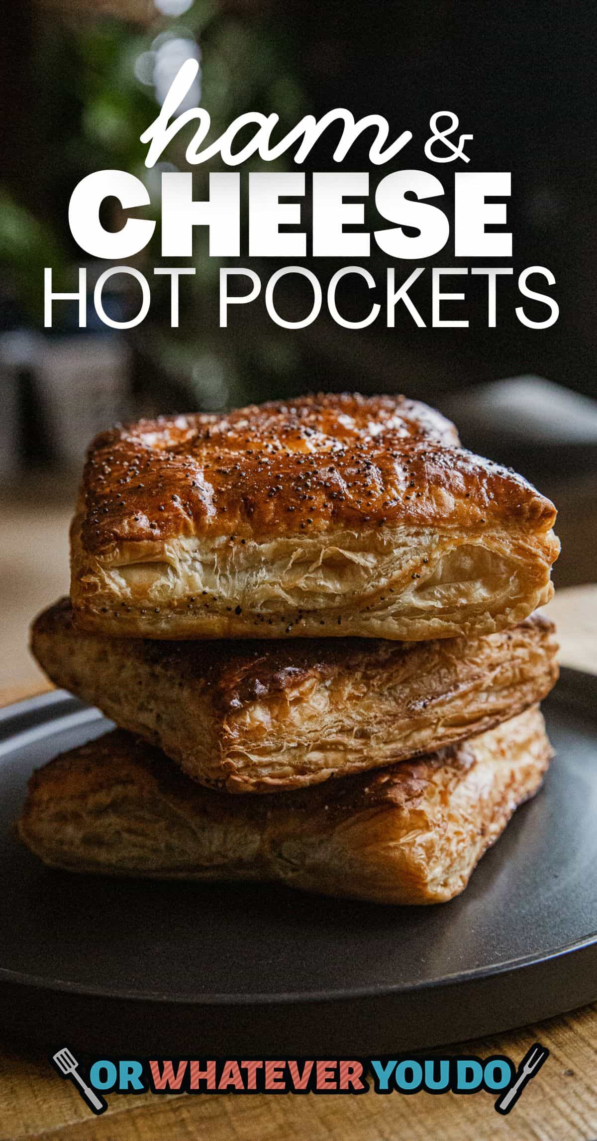 Delicious ham and cheese hot pockets on a black plate, perfect for quick snacks.