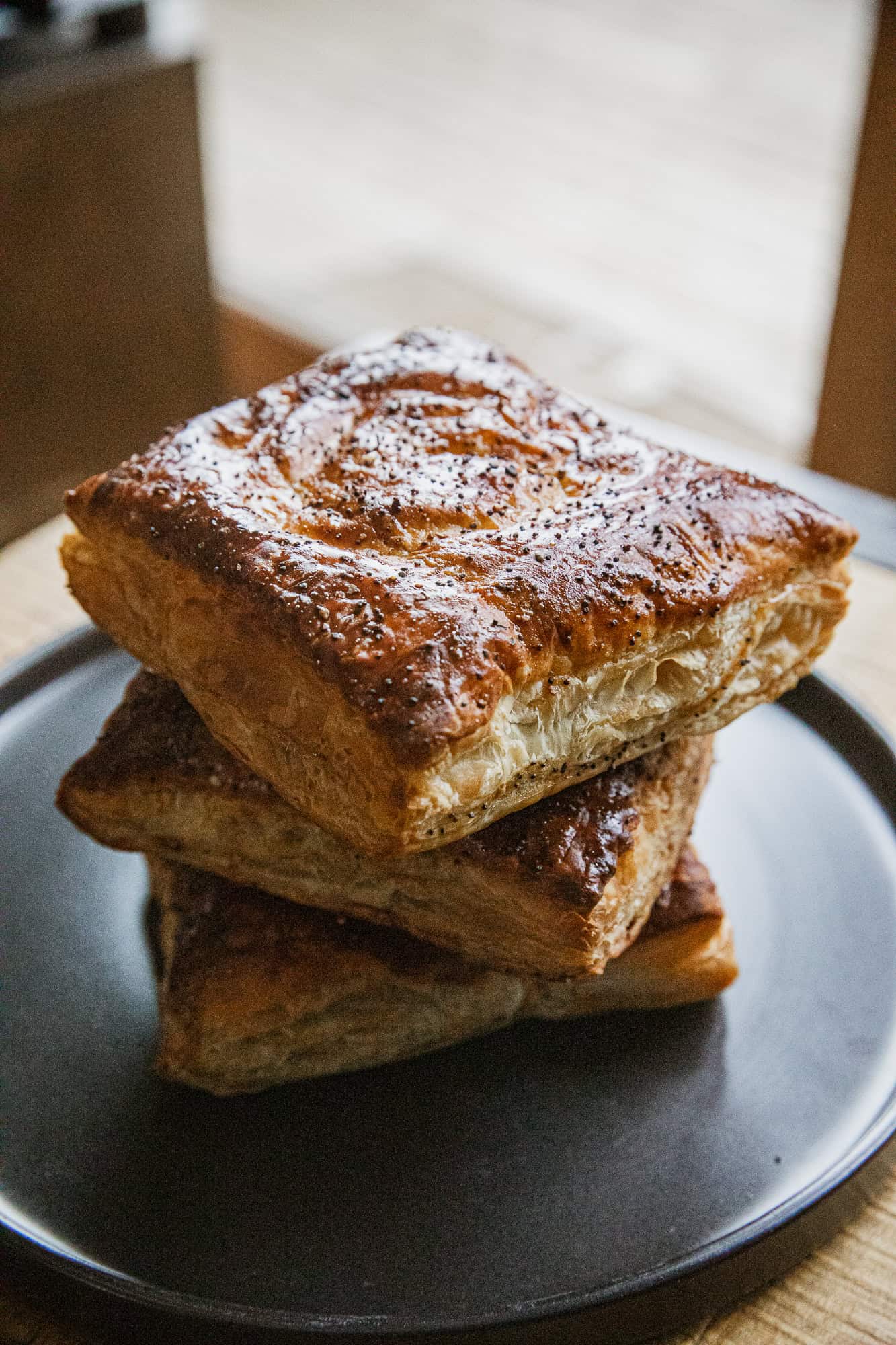 Delicious Traeger-cooked ham and cheese hot pockets, crispy and golden, perfect for a savory snack o.