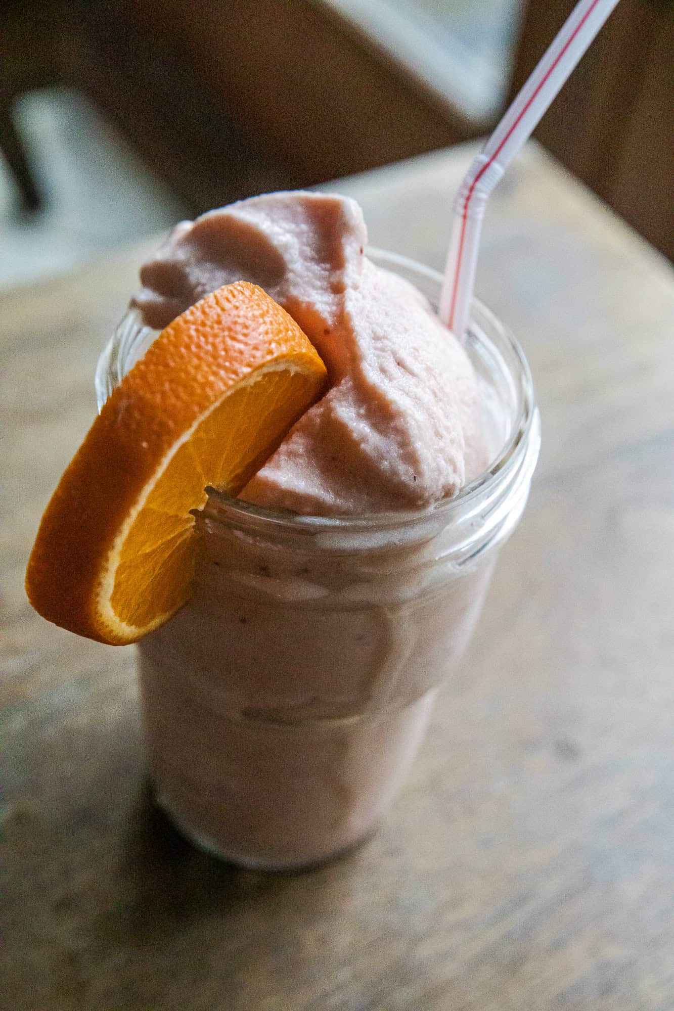 Delicious Strawberry Orange Julius Ninja Slushi with fresh fruit and creamy texture. Perfect summer.