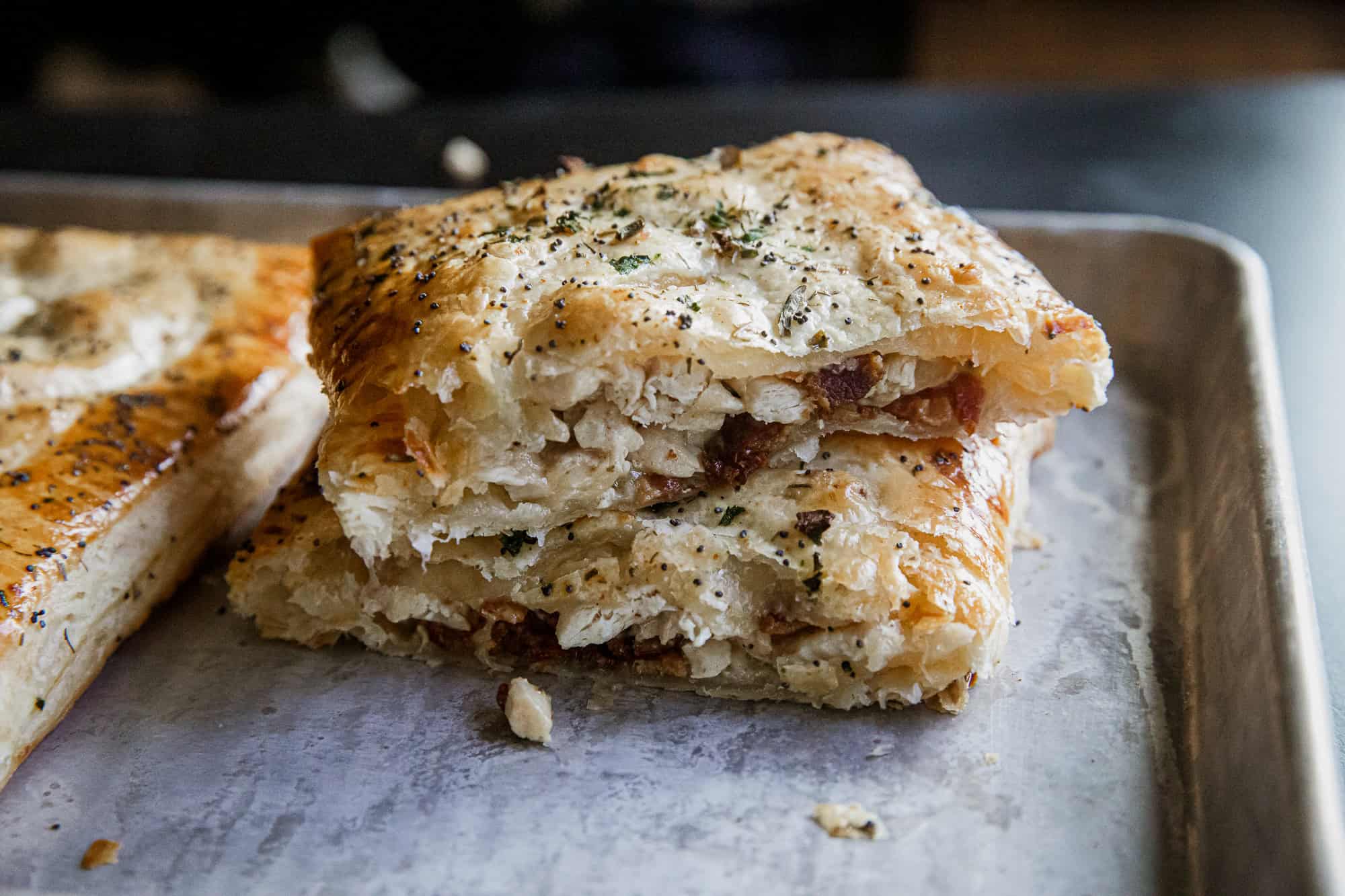Close-up of a Chicken Bacon Ranch Hot Pocket showing crispy crust and savory filling.