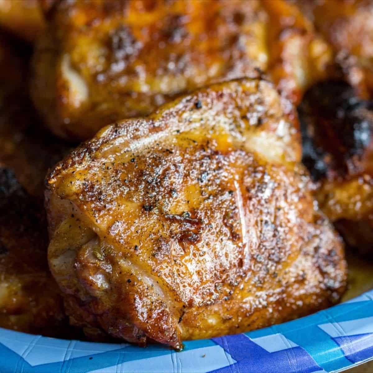 Juicy grilled chicken thighs seasoned and cooked to perfection.