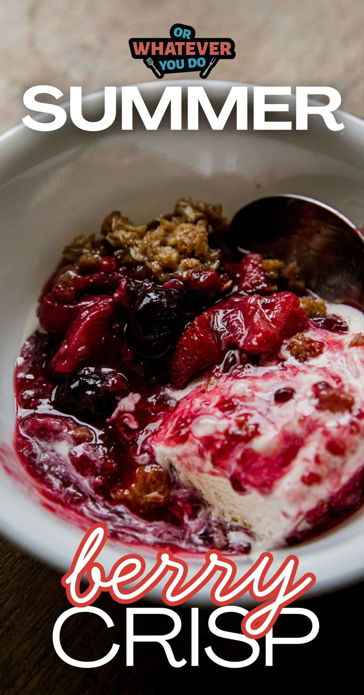 Close-up of berry crisp with ice cream in a bowl for summer dessert.