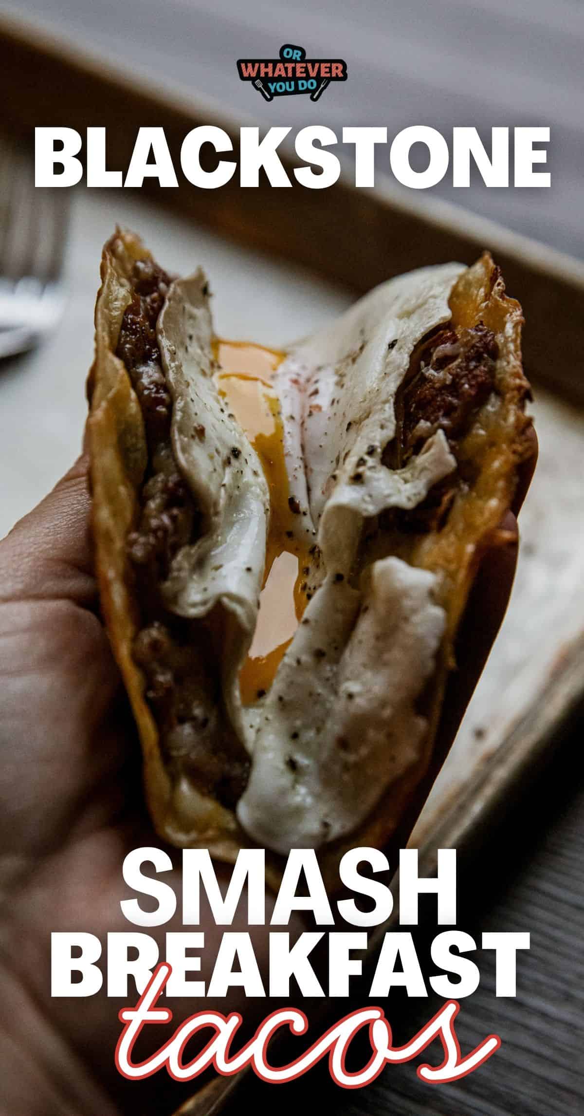 Close-up of a breakfast taco with eggs, meat, and cheese from Blackstone Smash Breakfast Tacos.