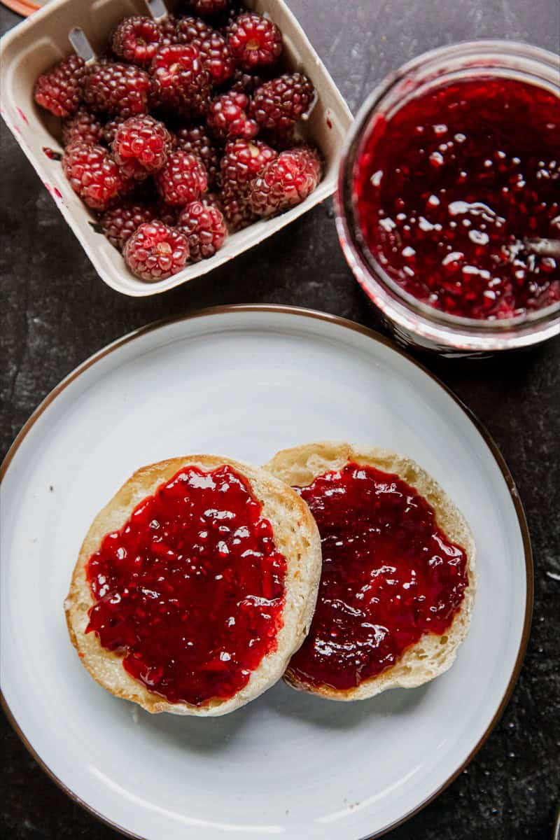 Fresh tayberries and homemade tayberry jam on toast for breakfast.