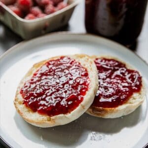 Close-up of toast with fresh tayberry jam spread.
