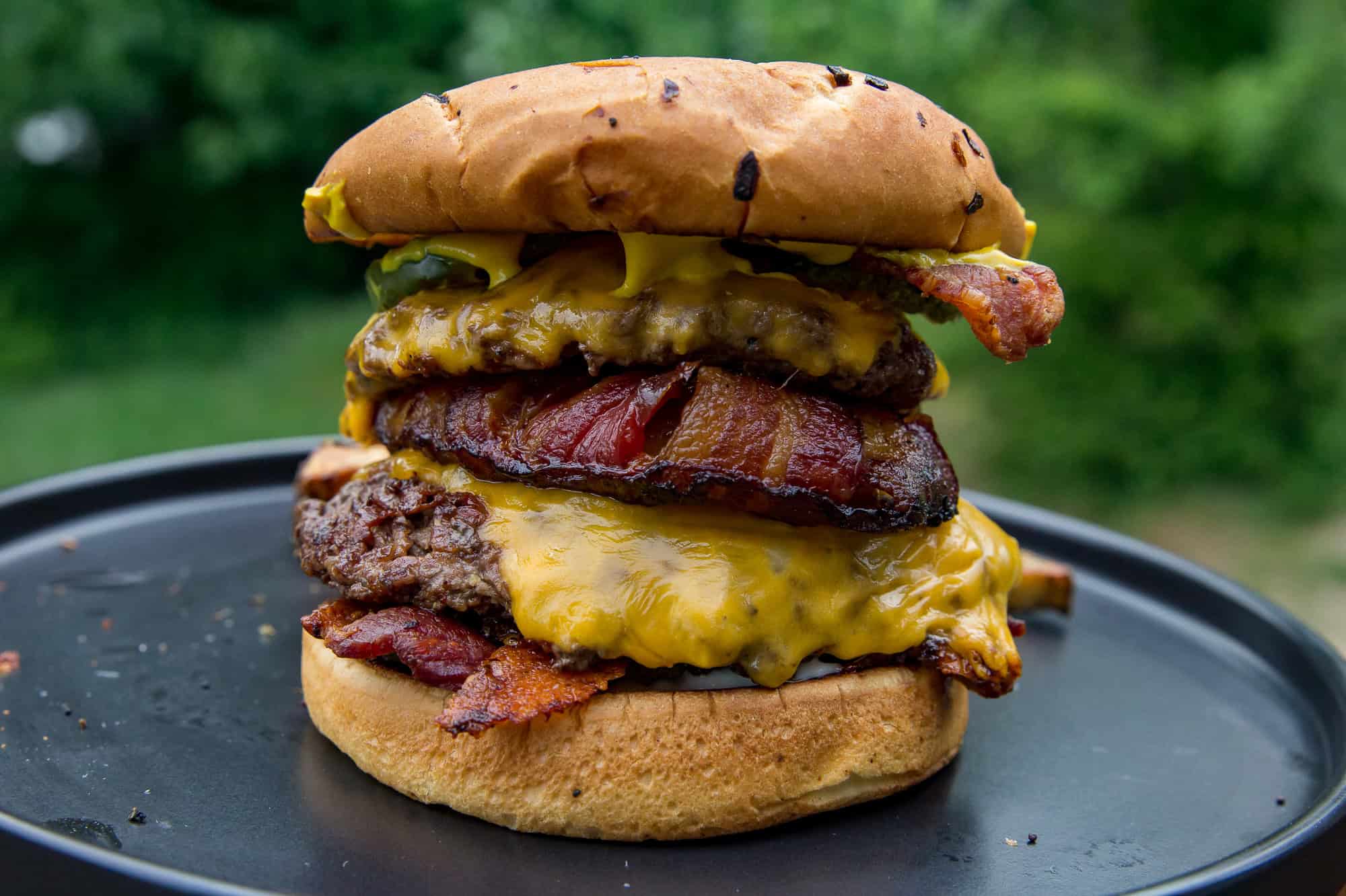 Juicy bacon cheeseburger with melted cheese and crispy bacon.
