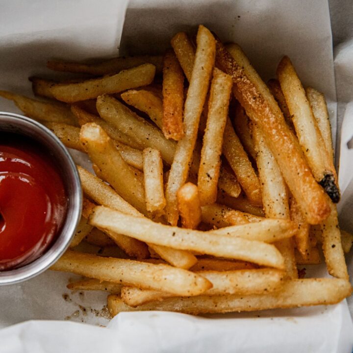 Frozen french fries cooked crispy on a Blackstone griddle.