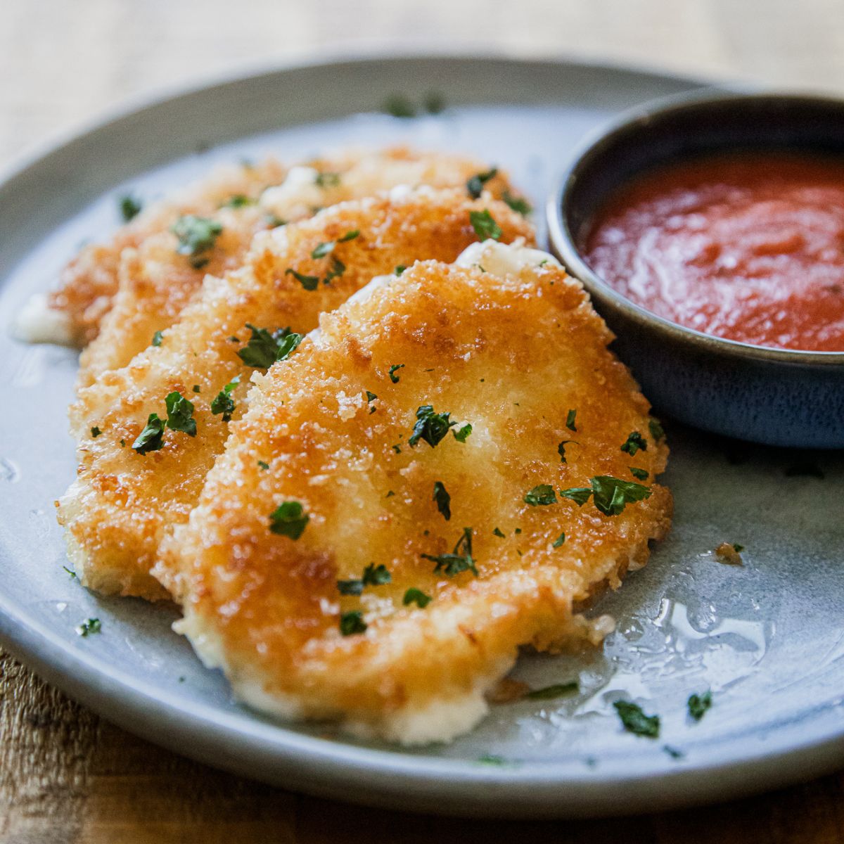 Blackstone fried mozzarella with marinara dipping sauce.