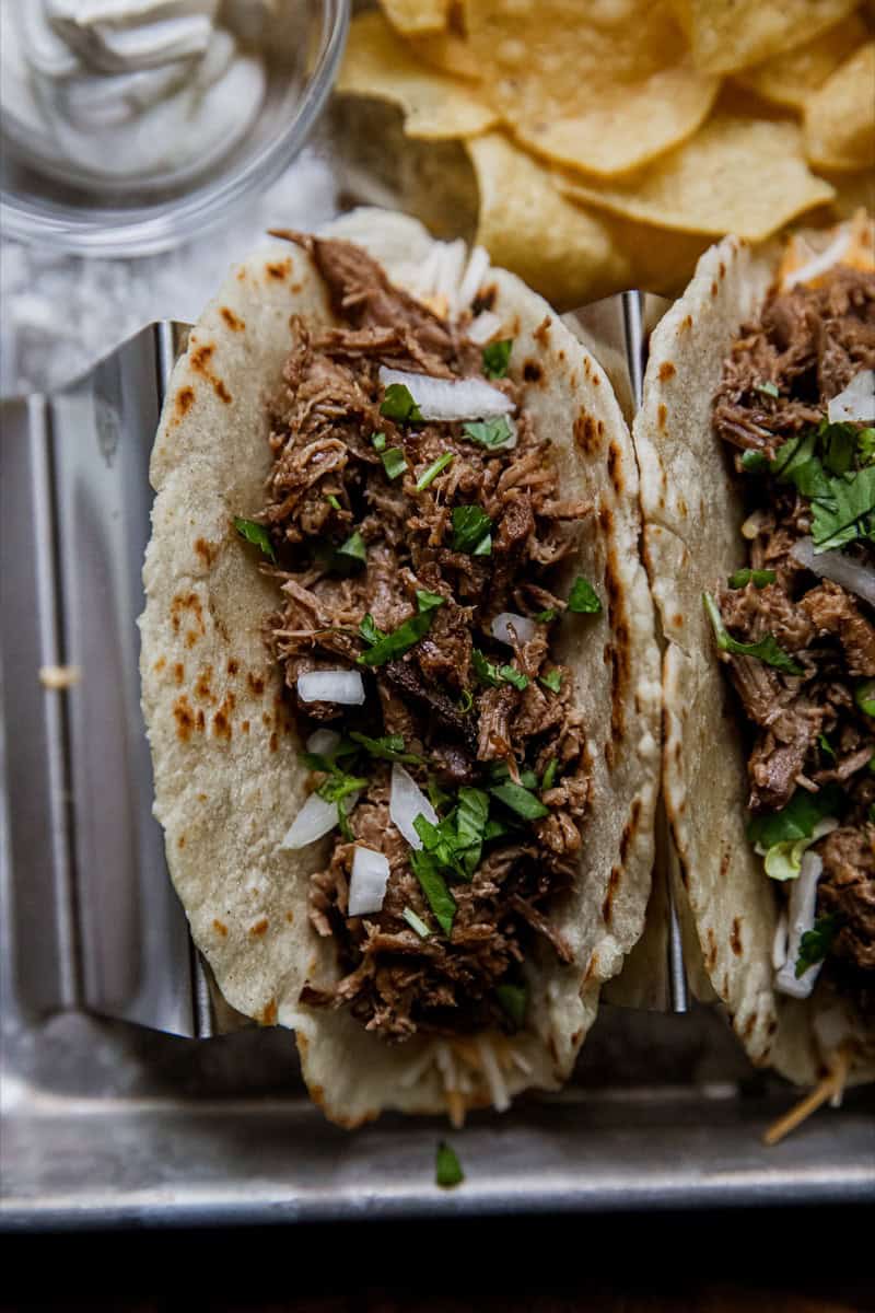 shredded chuck roast tacos in homemade tortillas