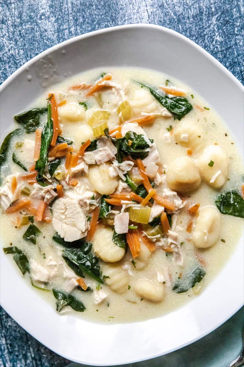 Creamy chicken gnocchi soup in a white bowl