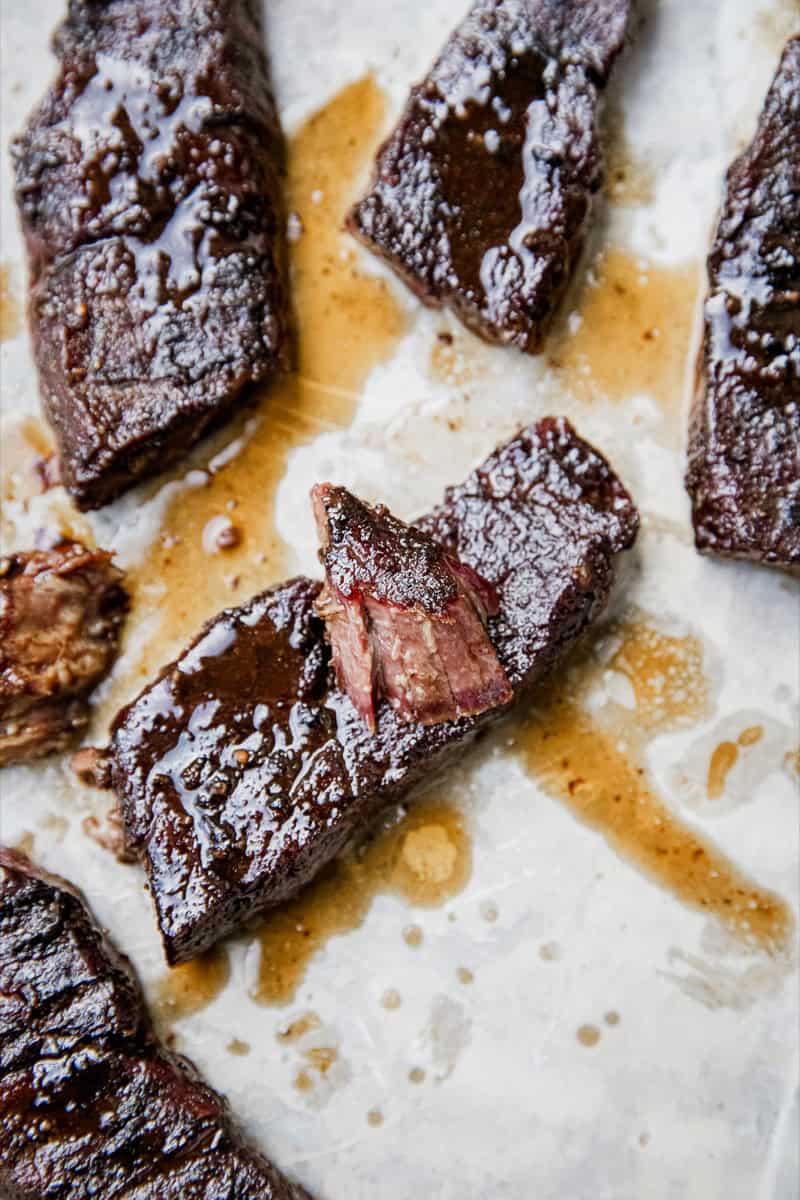 Juicy smoked boneless chuck short ribs with caramelized exterior.