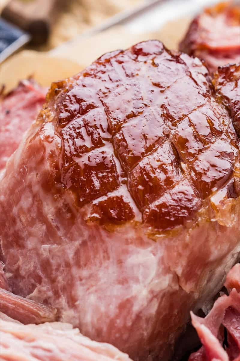 Juicy double smoked picnic ham with glazed surface and tender meat.