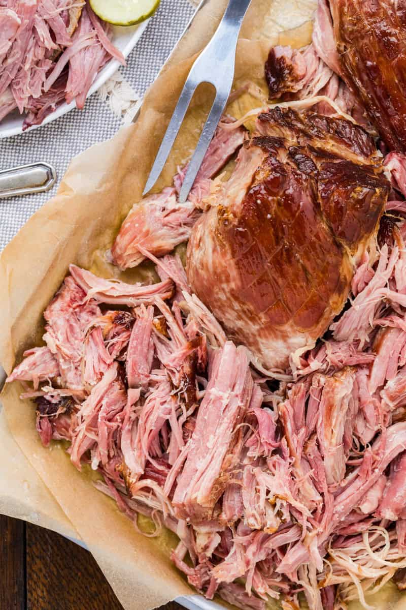 Juicy, tender double smoked picnic ham sliced for serving.